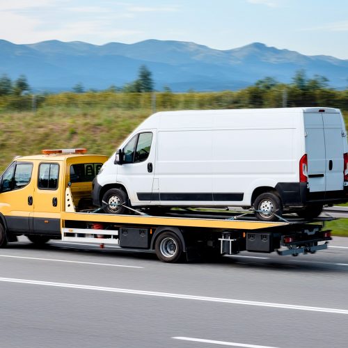 Road Assistance Tow-Truck With Out-Of-Order Commercial Cargo Bus